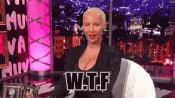 a woman with a speech bubble that says w.t.f on it