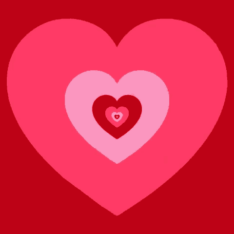 a pink heart with red hearts in it