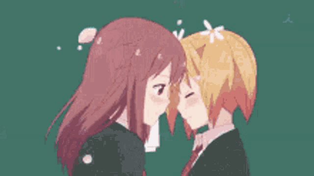 two anime girls are kissing each other in a close up .