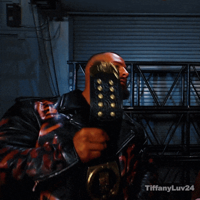 a man in a leather jacket is holding a championship belt with tiffanyluv24 written on the bottom right