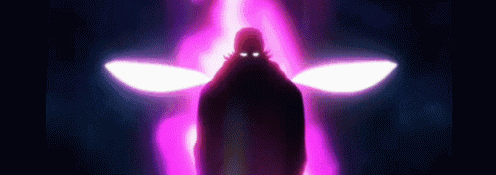 a silhouette of a person standing in front of a purple light in the dark .