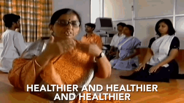a group of people are sitting in a room with the words healthier and healthier on the top