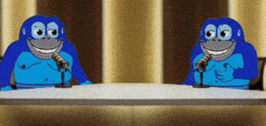 two blue cartoon gorillas sit at a table with microphones