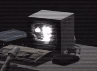 a computer monitor with the letter x on the screen
