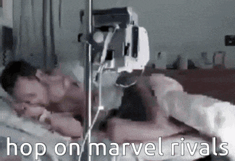 a man is laying in a hospital bed with an iv attached to his chest .