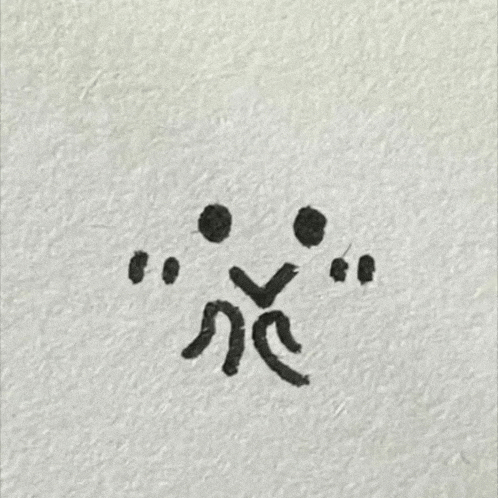 a drawing of a person with circles around their heads on a piece of paper