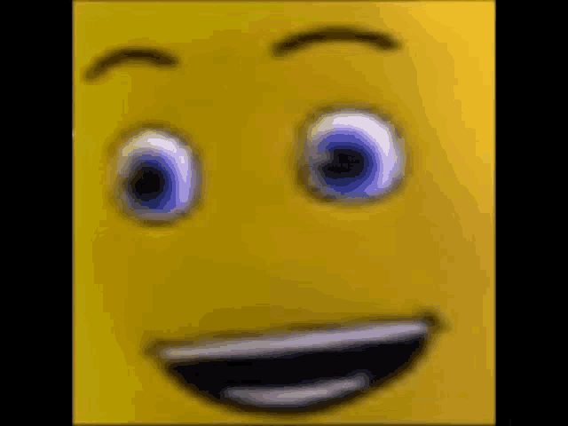 a close up of a cartoon face with blue eyes and a smile .
