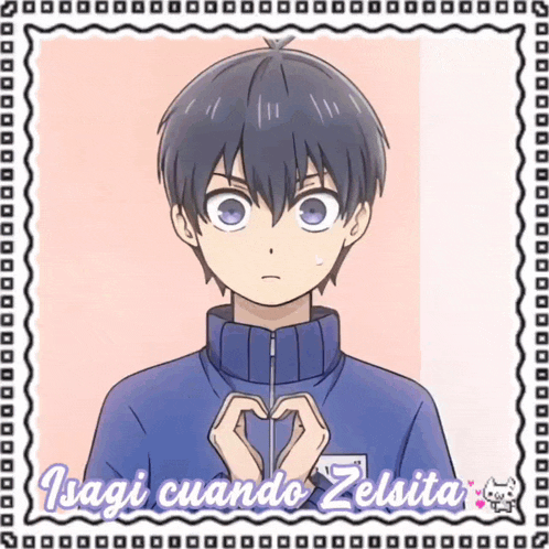 a picture of a boy making a heart shape with his hands and the words isagi cuando zelsita below him