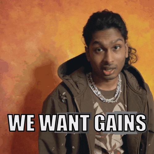 a man says we want gains while wearing a brown jacket
