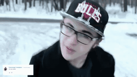 a man wearing glasses and a hat that says bulls