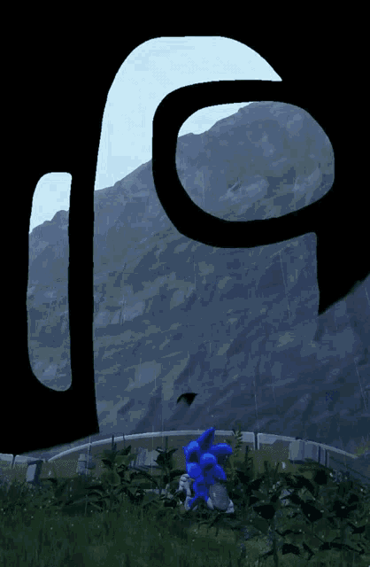 a blue sonic the hedgehog is standing in front of a mountain in a video game