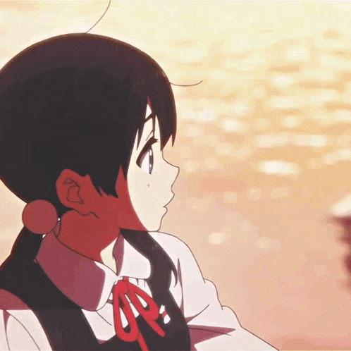 a girl in a school uniform with a red bow