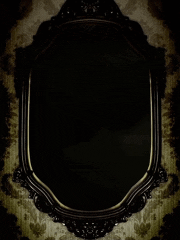 a portrait of a woman in a dark frame