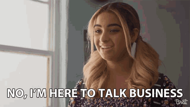 a girl says " no i 'm here to talk business " in front of a window
