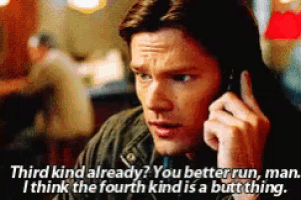 a man is talking on a cell phone and says " third kind already you better run man "