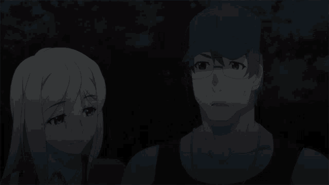 a man and a woman are standing next to each other