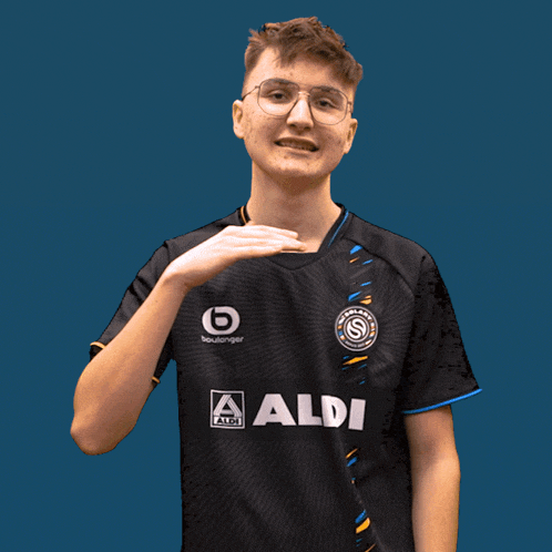 a boy wearing a black shirt with aldi on it
