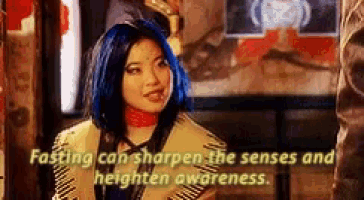 a woman with blue hair has the words fasting can sharpen the senses and heighten awareness written below her