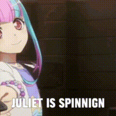 a picture of a girl with pink and blue hair and the words juliet is spinnigg .