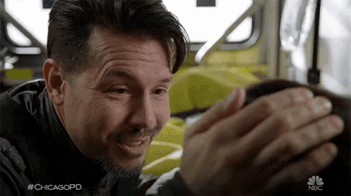 a man on a bus with #chicagopd on the bottom right