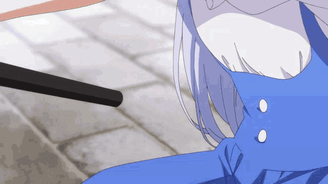 a girl in a blue dress with white buttons