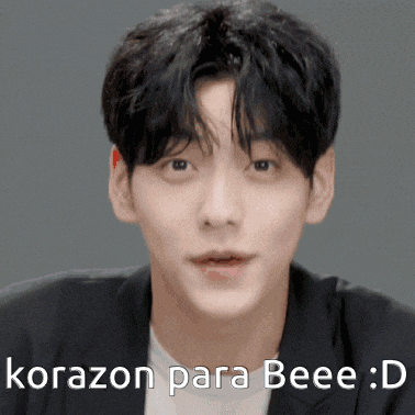 a close up of a man 's face with the words korazon para beee : d written below him