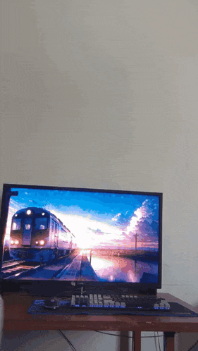 a dell monitor shows a train on the screen