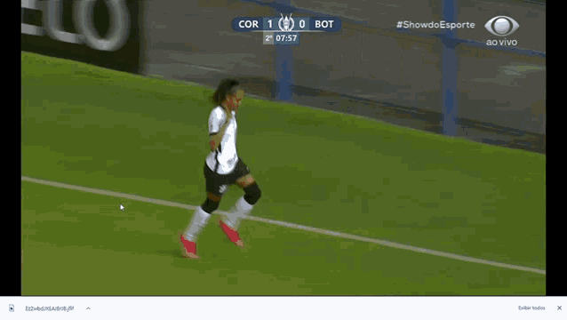 a soccer game is being shown on a tv screen