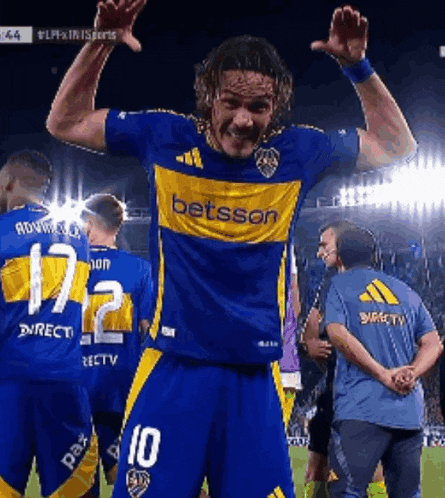 a soccer player wearing a betsson jersey is celebrating