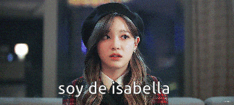a woman wearing a black beret and a plaid jacket says soy de isabella