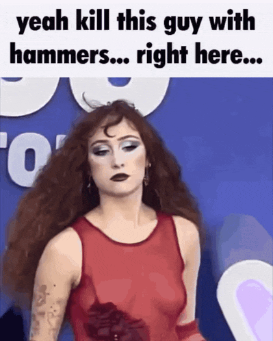 a woman in a red dress is standing in front of a sign that says " yeah kill this guy with hammers ... right here "