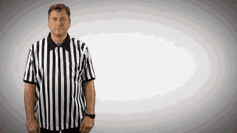 a man in a black and white striped shirt
