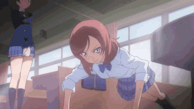 a girl with red hair and blue eyes is doing push ups in a classroom