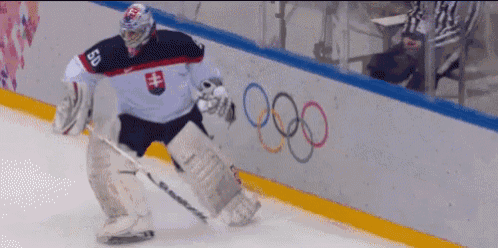 a hockey player wearing a jersey with the number 60 on it