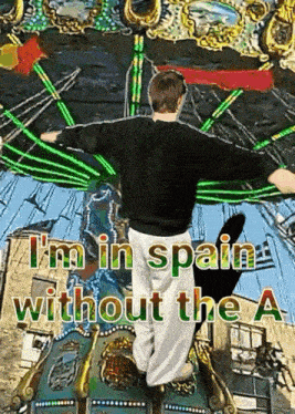 a man standing on a carousel with the words i 'm in spain without the a on the bottom