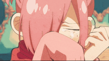 a girl with pink hair is crying with a tear coming out of her eye
