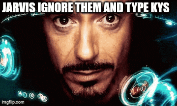a close up of a man 's face with the words jarvis ignore them and type kys above him