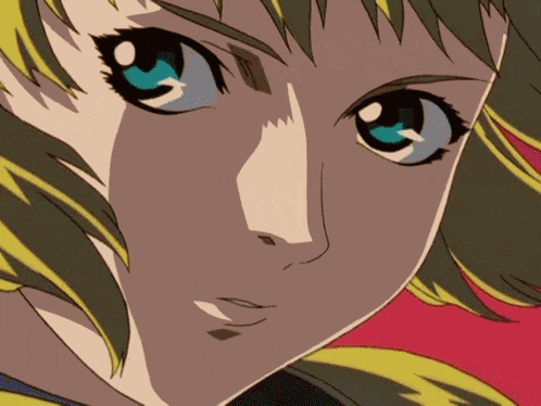 a close up of a girl with blue eyes