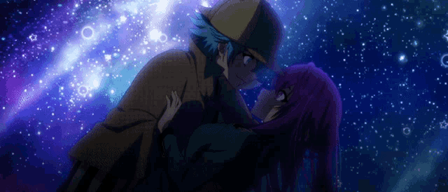 a man and a woman are kissing in front of a starry night sky