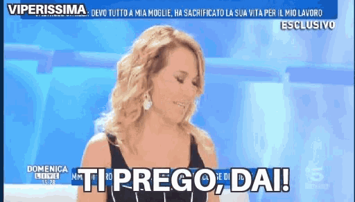 a woman on a tv show with the words ti prego dai on the screen