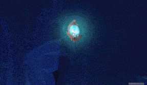 a person is standing in front of a circular object with a blue light in the center