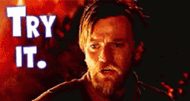 a man with a beard is standing in front of the words try it