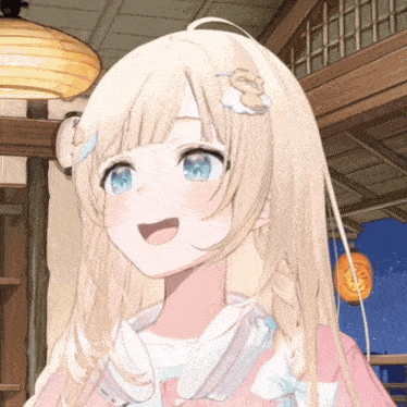 a girl with blonde hair and blue eyes is smiling and wearing headphones