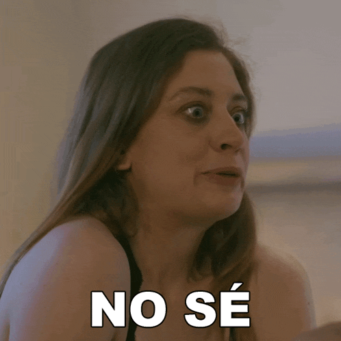 a woman with a surprised look on her face has the word no se written in white
