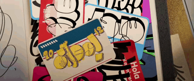 a stack of cards with one that says " hello " on it
