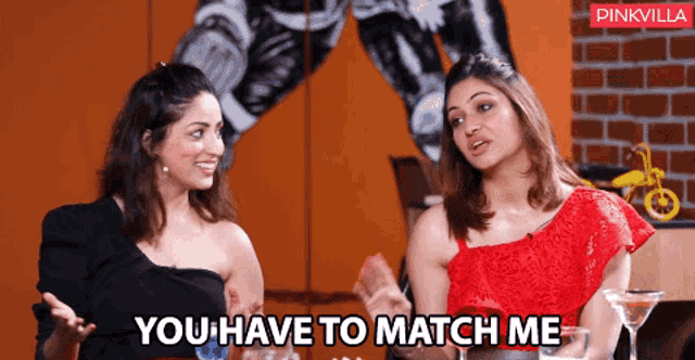 two women sitting next to each other with the words " you have to match me " on the bottom