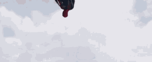 a spiderman holding a captain america shield on top of a vehicle