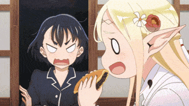 a girl with a flower in her hair is holding a sandwich