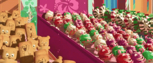 a bunch of stuffed animals are lined up on a shelf