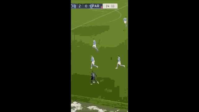 a soccer game is being played on a field with a score of 2-0 .